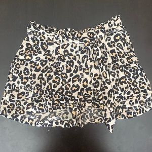 Cheetah print shorts with belt. Size US 4